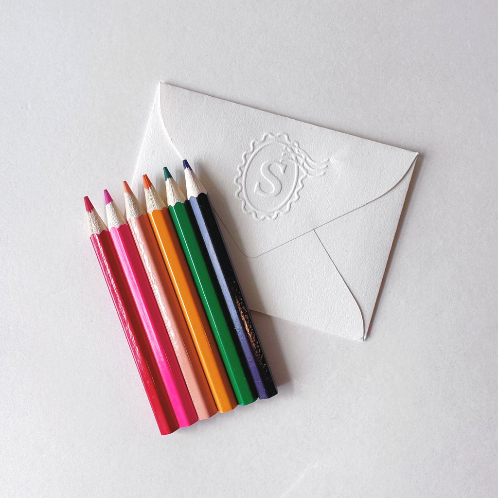 Mini colored pencils in embossed envelope